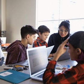 New era, new language: Students solve problems with coding