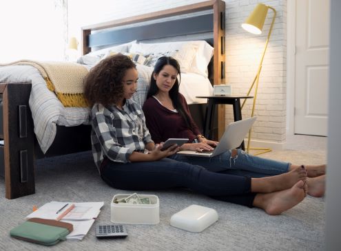 Mom and daughter making online purchase