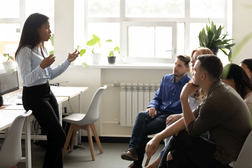 A technology coach works with teachers