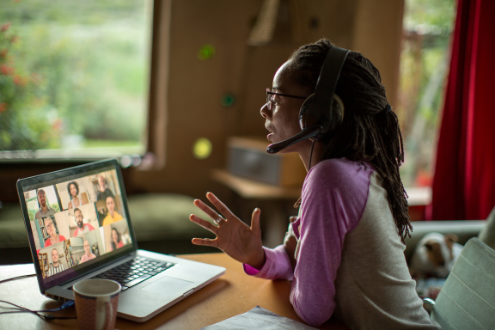 A teacher collaborates with others online
