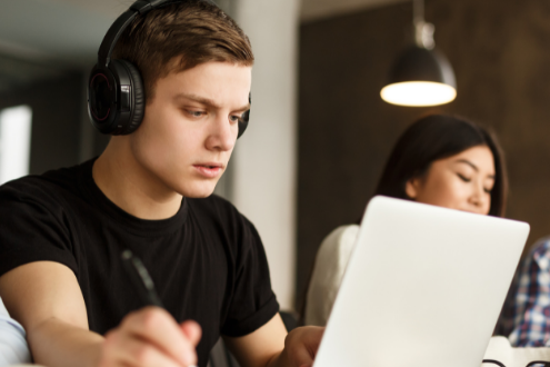A student listens to a poem while trying to analyze it