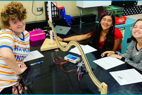 Modesto students work on a project at a desk
